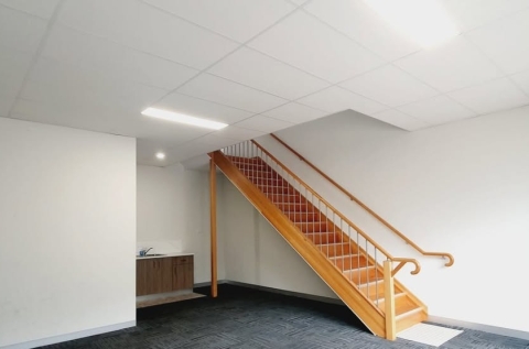 Staircase to upstairs office location (Bottom floor is occupied by another company)