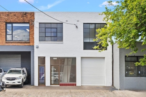 Facade: door on the left is the entry to the studio/first floor