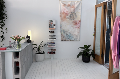 This wall can be cleared easily and you can set up lighting, we have done this many times with lots of equipment and everything worked amazing!