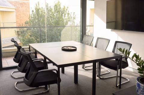 Bright, private workspace and meeting room for creative practitioners and small teams.